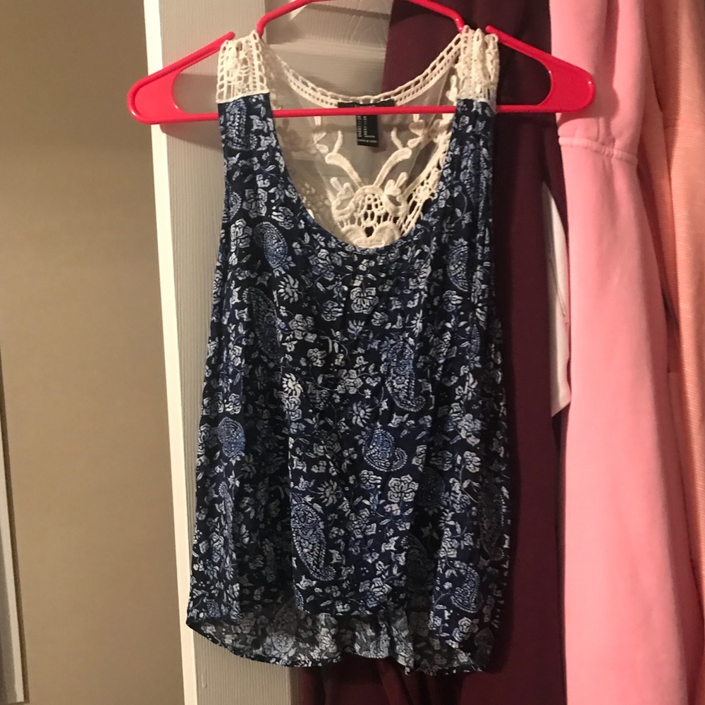 Blue floral tank top with white lace back